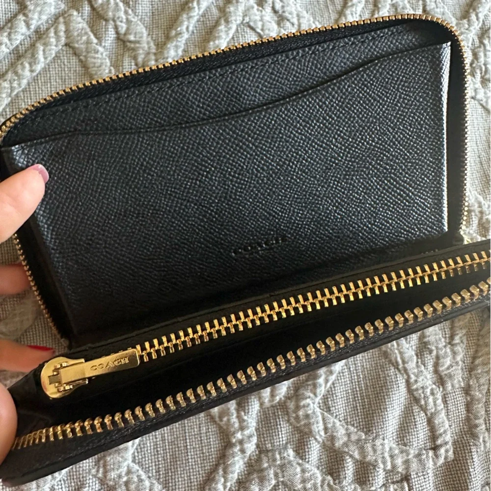 Coach wristlet zip around black pebble wallet